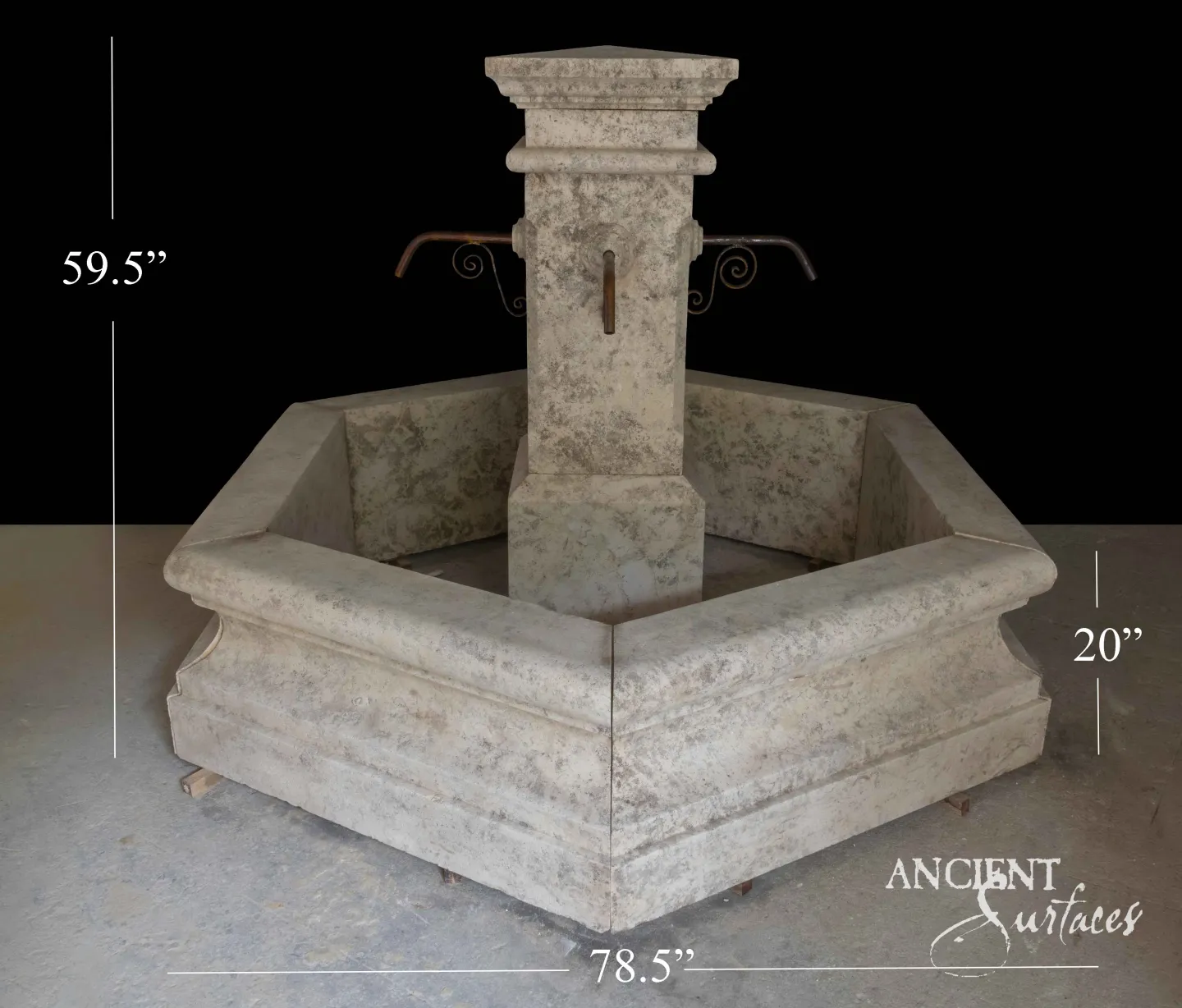 Reclaimed hexagonal limestone fountain from Ancient Surfaces shown with dimensions, a tapered centre pillar and two iron spouts